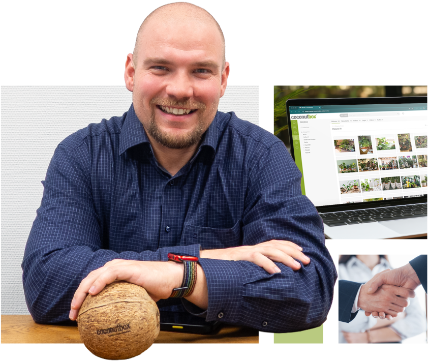 Mitarbeiter der coconutbox hat Kokosnuss mit Logo in der Hand