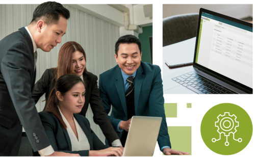 Team arbeitet gemeinsam an einem Laptop